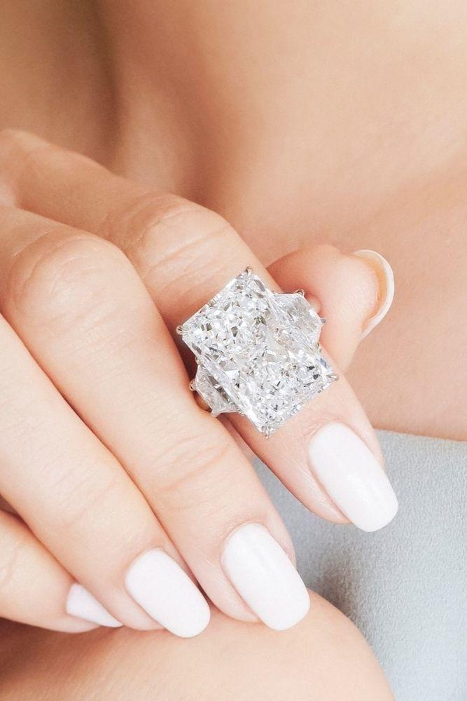 diamond wedding rings with emerald cut center stone1