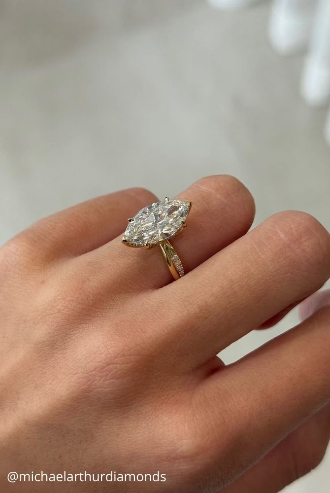 marquise diamond marquise cut diamond ring twist band in yellow gold michaelarthurdiamonds