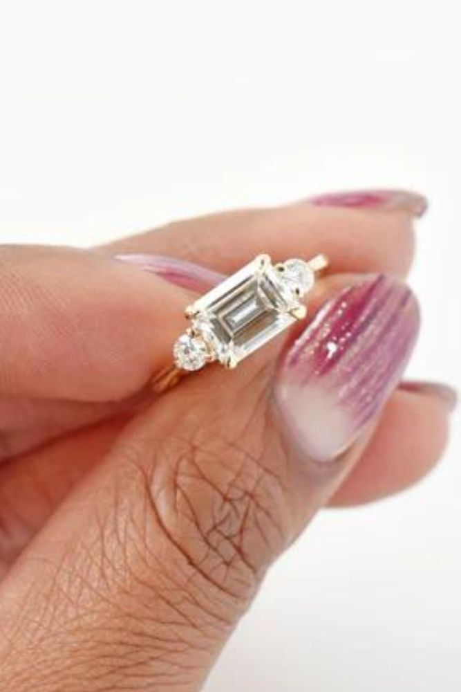 solitaire engagement rings emerald cut rings