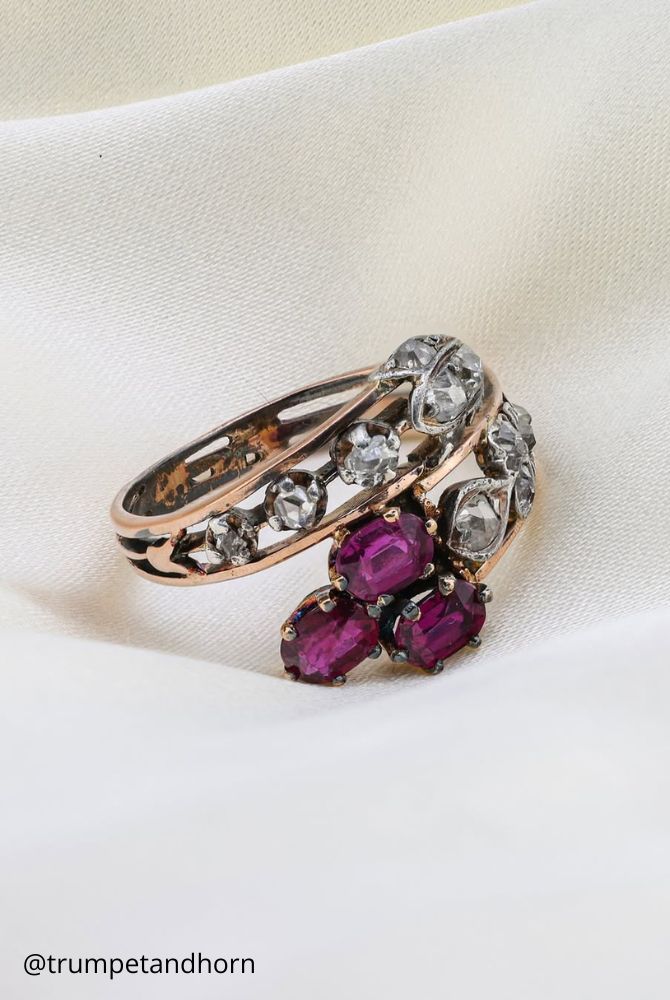 vintage engagement rings from yellow gold unusual vintage shapes unique decoration burgundy stones trumpetandhorn