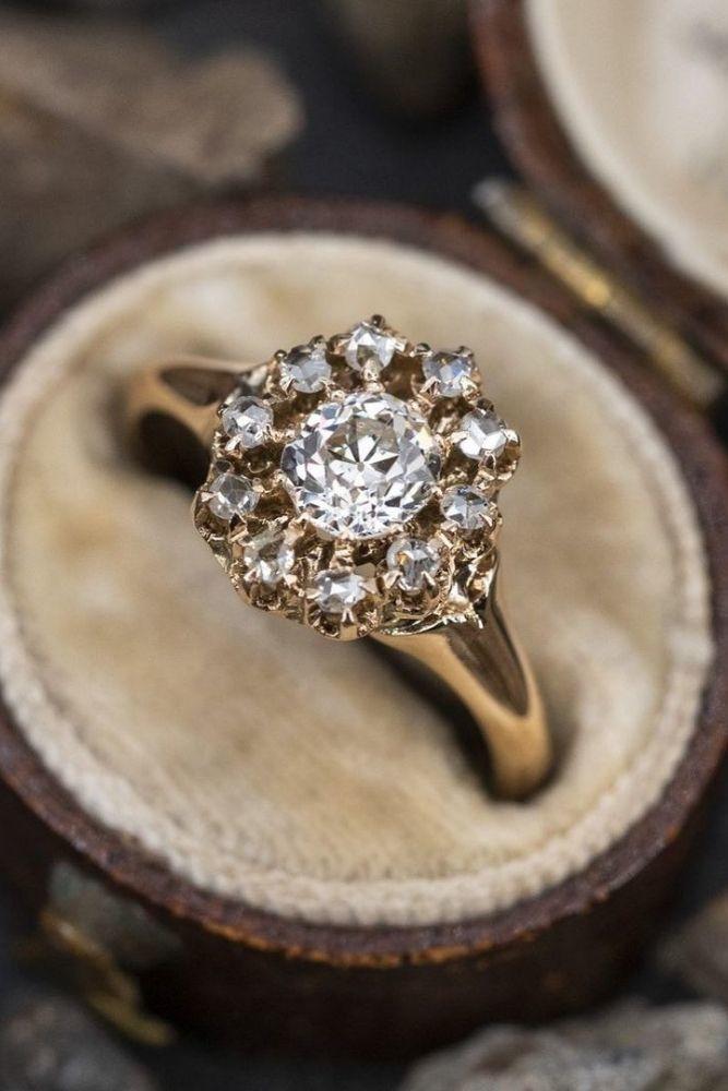 vintage engagement rings with round cut center stone1
