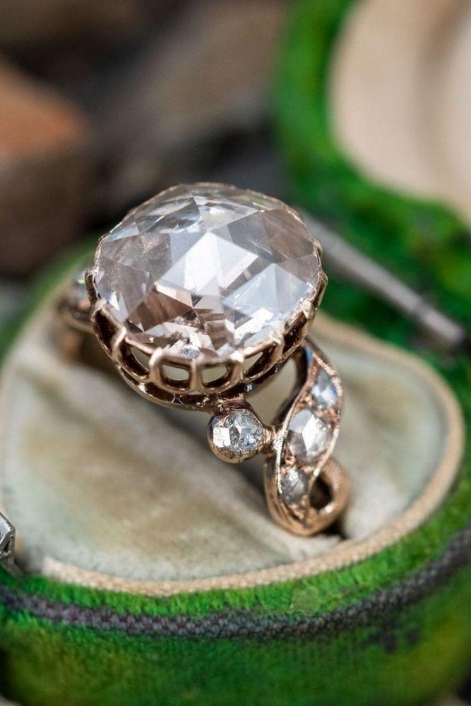 vintage engagement rings with round cut center stone2