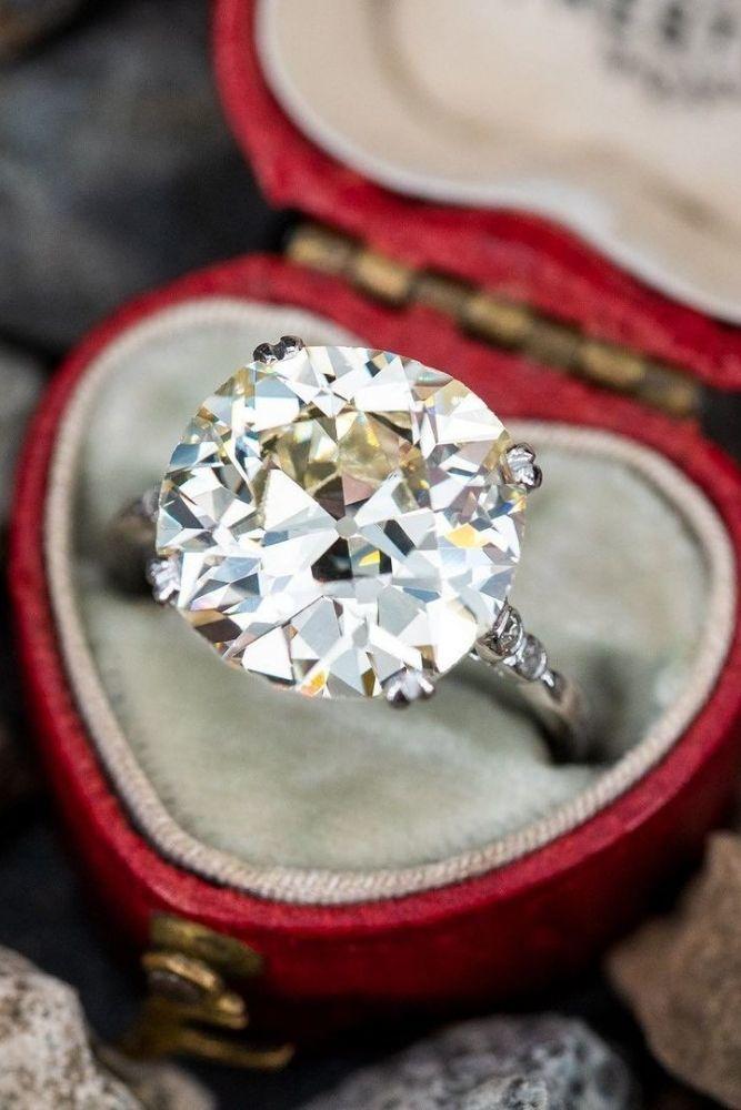vintage engagement rings with round cut center stone