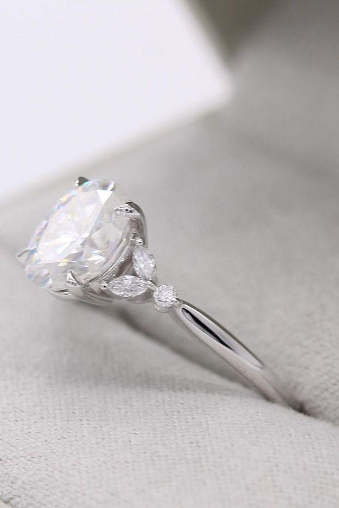vintage engagement rings with round cut center stone2
