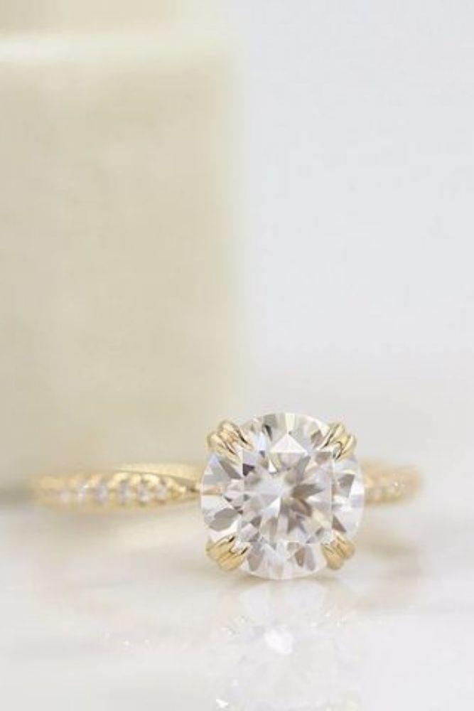 vintage engagement rings with round cut center stone2