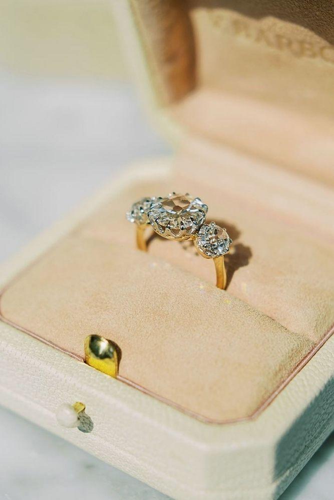 vintage engagement rings with round cut center stone1