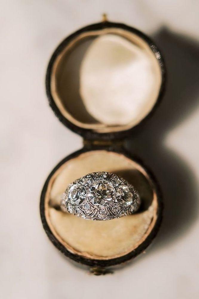 vintage engagement rings with round cut center stone