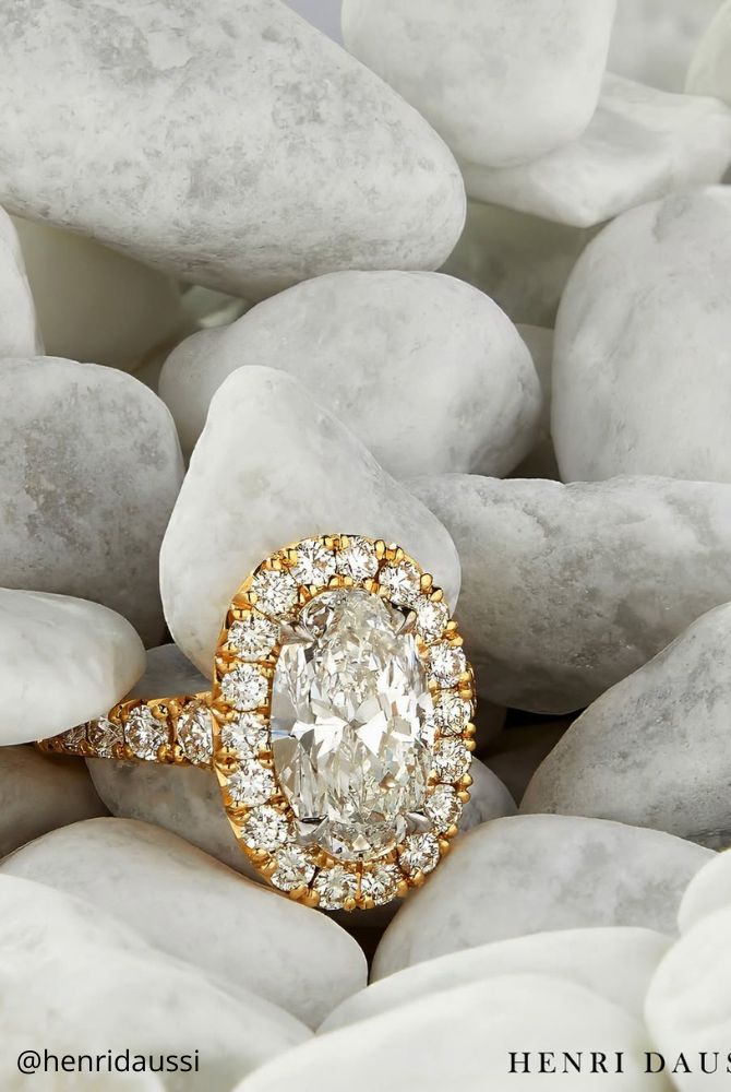oval engagement rings gold engagement ring with shining stone large stone studded with small halo yellow gold henridaussi