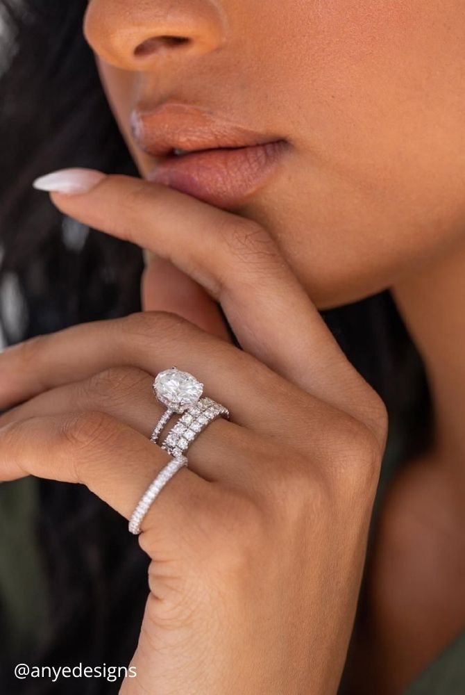 oval engagement rings oval cut diamond engagement ring paired with thick diamond wedding band anyedesigns