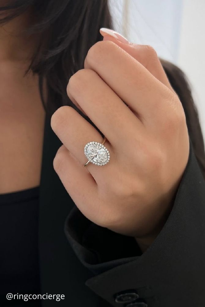 oval engagement rings oval cut diamond engagement ring with sparkling halo on plain band ringconcierge