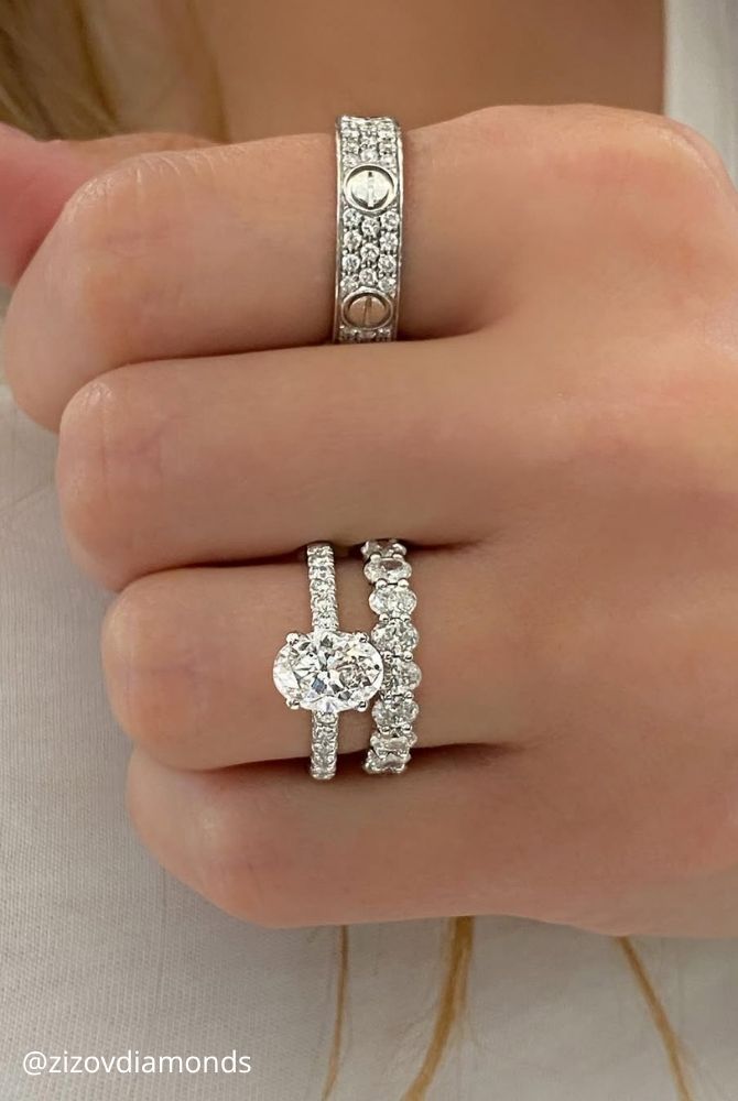 oval engagement rings oval cut diamond ring stacked with eternity band and wide pave diamond ring zizovdiamonds