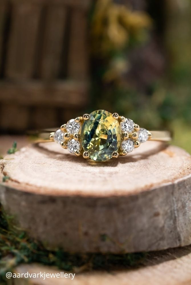 oval engagement rings oval cut green sapphire ring with diamond clusters on yellow gold aardvarkjewellery