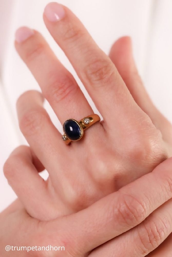 oval engagement rings vintage bezel set oval cut dark blue sapphire ring with accent diamonds in yellow gold trumpetandhorn