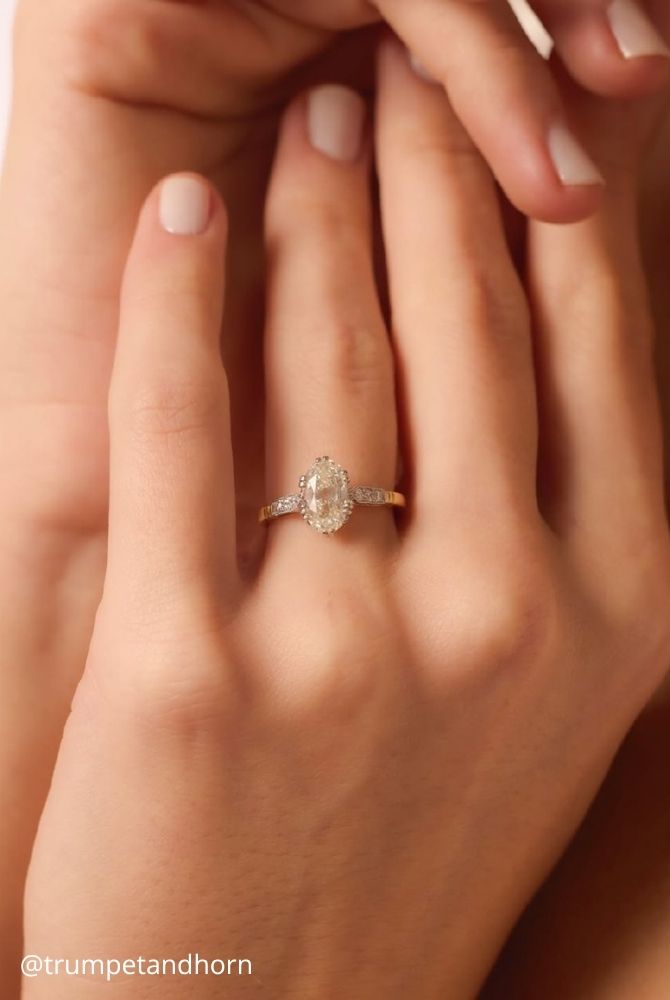 oval engagement rings vintage oval cut diamond ring with small side stones on gold band trumpetandhorn