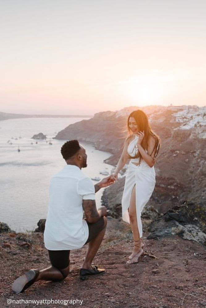 cheap proposal ideas a guy proposes to a girl on the hill nathanwyattphotography