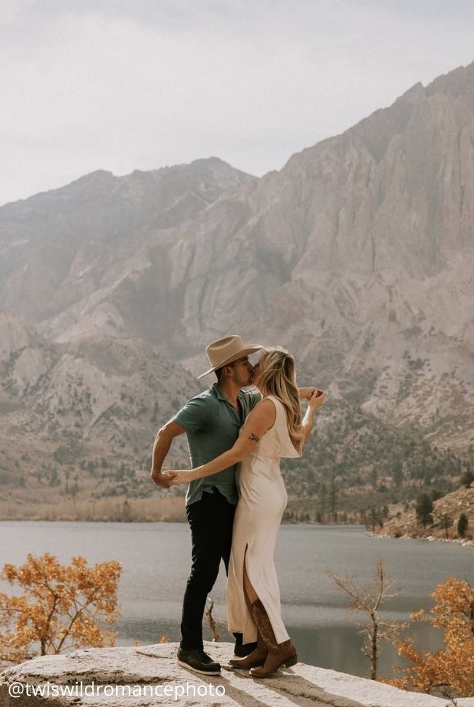 cheap proposal ideas happy bride hugs around the mountains proposal in nature twiswildromancephoto