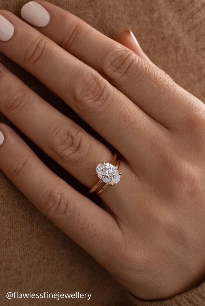 diamond wedding rings oval diamond solitaire ring with yellow gold wedding band flawlessfinejewellery