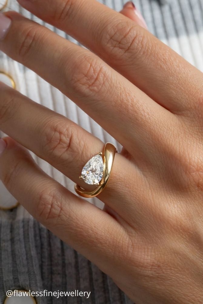 diamond wedding rings pear cut diamond solitaire ring in yellow gold with bypass shank flawlessfinejewellery