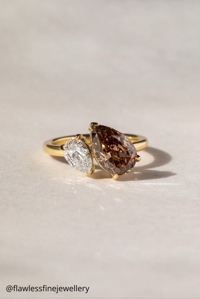 diamond wedding rings toi et moi two stone ring with pear cut brown and champagne diamonds in yellow gold flawlessfinejewellery