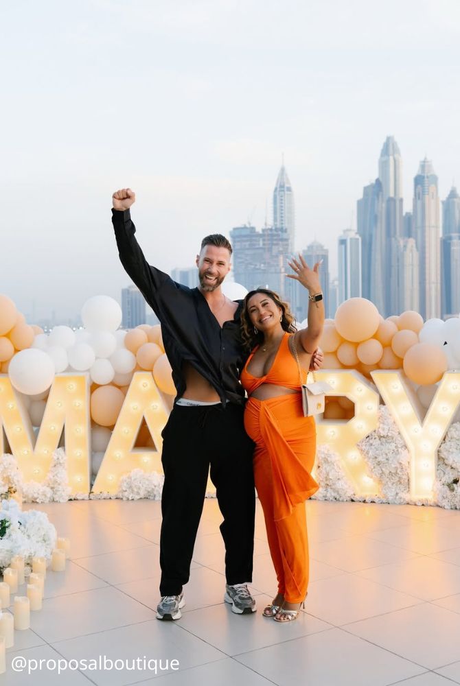 engagement photos creative proposal man happy she said yes flower photozone proposalboutique