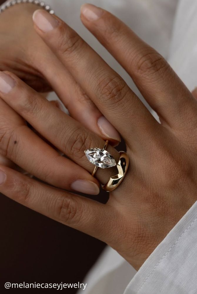 solitaire engagement rings yellow gold marquise stones delicate pointed ring melaniecaseyjewelry