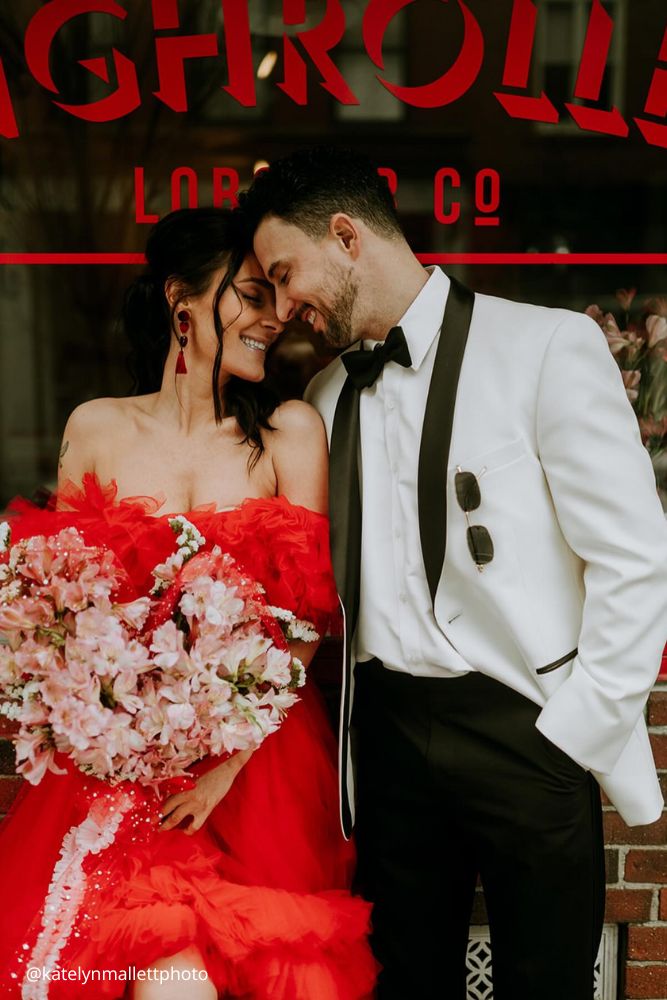 valentines day proposal loe couple after proposal in restaurant girl in red dress katelynmallettphoto