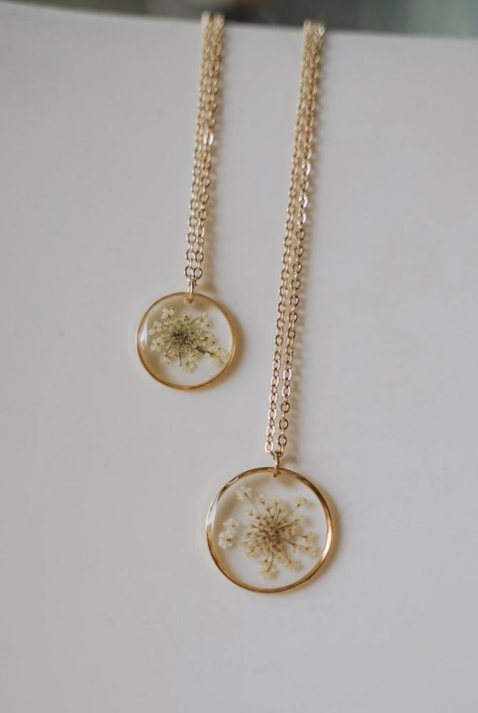 pressed flowers necklace with white flowers